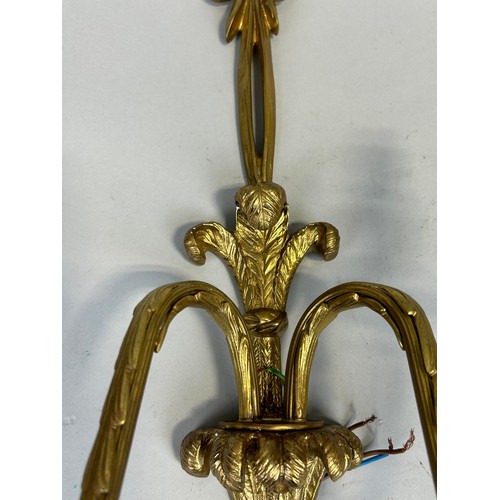 1105A - A PAIR OF 20TH CENTURY LOUIS XVI STYLE GILT BRONZE WALL LIGHTS WITH FLEUR DU LYS DESIGN 64cm x 34cm ... 