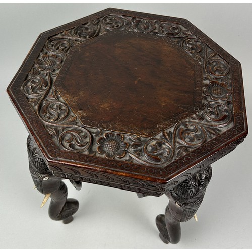 1126 - AN INDIAN OCCASIONAL TABLE WITH ELEPHANT HEAD SUPPORTS 34cm x 30cm