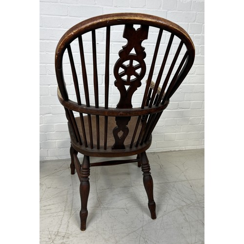 1132 - AN ASH AND ELM WINDSOR ARMCHAIR STAMPED 'F.W' 105cm x 70cm x 55cm