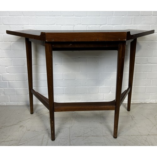 1145 - A MID-CENTURY WRITING DESK, IN THE STYLE OF GORDON RUSSELL (1892-1980) Teak, brass and black leather... 