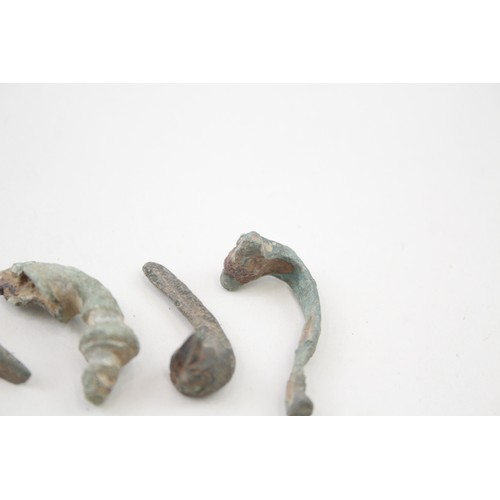 1159 - COLLECTION OF PARTIAL ROMAN TRUMPET BROOCHES