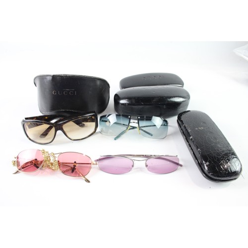 1167 - A VARIETY OF DESIGNER SUNGLASSES/GLASSES INCLUDING GUCCI, INCLUDING CASES (4)