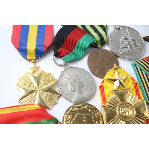 1180 - A COLLECTION OF MEDALS INCLUDING WW2, NATIONAL SERVICES, MALWAI INDEPENDENCE (10)