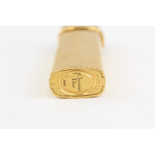 1207 - A CHRISTIAN DIOR PARIS GOLD PLATED POCKET LIGHTER SWISS MADE GUILLOCHE DESIGN