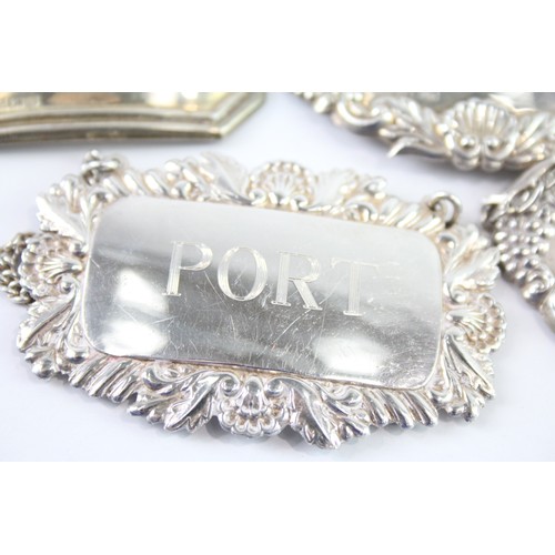 422C - FOUR .925 STERLING SILVER DECANTER LABELS

Weight: 47gms