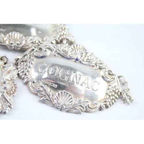 422C - FOUR .925 STERLING SILVER DECANTER LABELS

Weight: 47gms