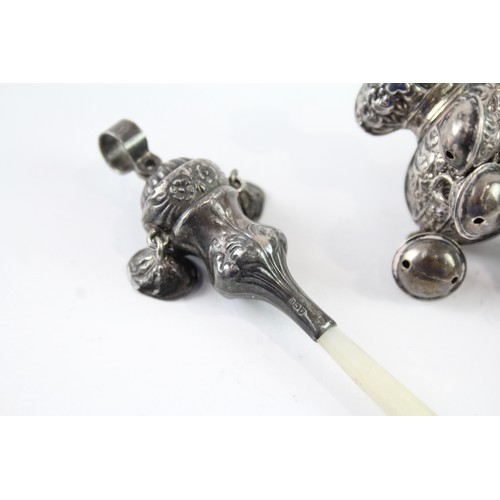 422J - TWO STERLING SILVER BABY RATTLES INCLUDING MOTHER OF PEARL

Weight: 68gms