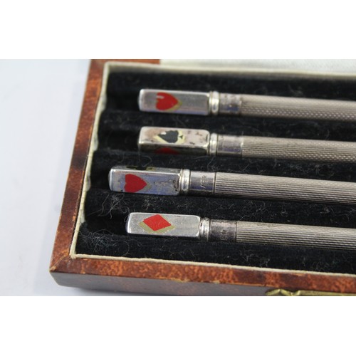 422Q - FOUR .925 STERLING SILVER CRIBBAGE PENCILS WITH ENAMEL, BOXED

Weight: 25gms