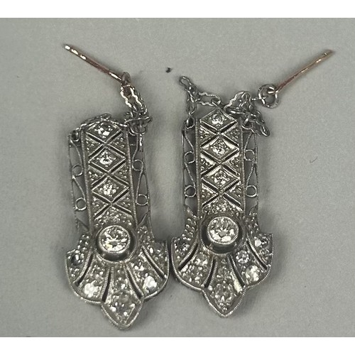 83A - A PAIR OF 18CT WHITE GOLD AND DIAMOND EARRINGS (2)

With antique box.