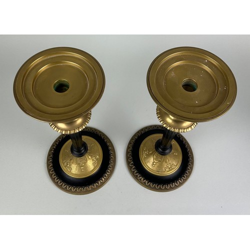 1075D - A PAIR OF GILT CANDLESTICKS