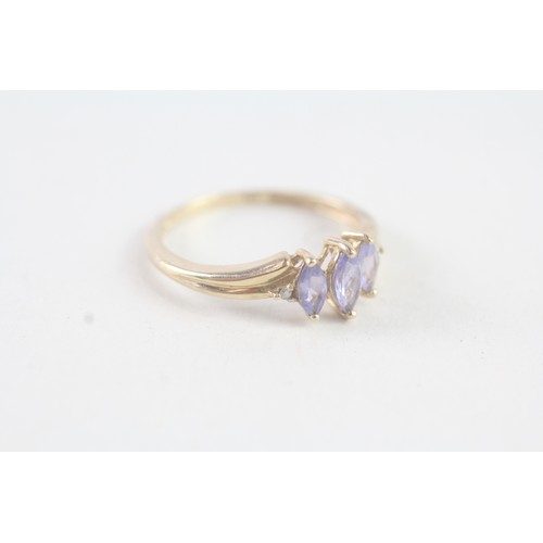 177 - A 9CT GOLD MARQUISE CUT TANZANITE AND DIAMOND DRESS RING Weight: 1.5 gms