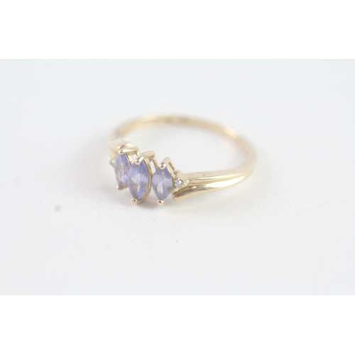 177 - A 9CT GOLD MARQUISE CUT TANZANITE AND DIAMOND DRESS RING Weight: 1.5 gms