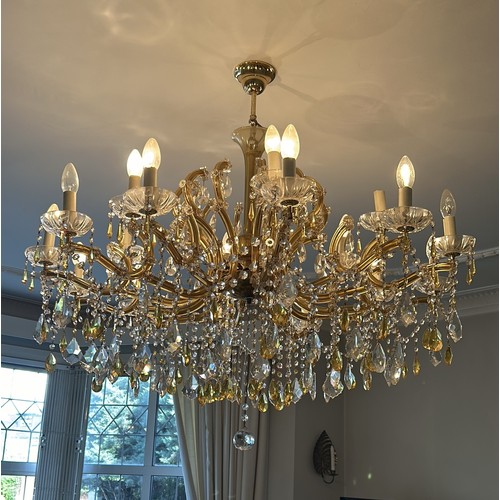 1001B - A MARIE THERESE MURANO CHANDELIER IN AMBER AND CLEAR CRYSTAL

110cm D and 100cm drop from ceiling.

... 