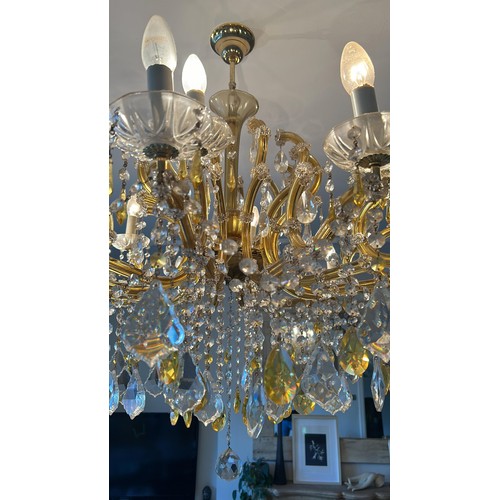 1001B - A MARIE THERESE MURANO CHANDELIER IN AMBER AND CLEAR CRYSTAL

110cm D and 100cm drop from ceiling.

... 