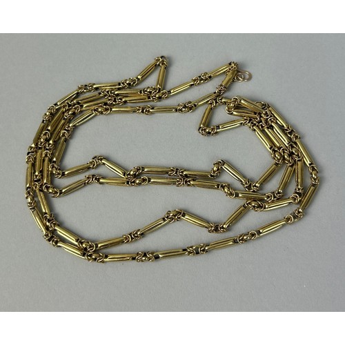 33 - AN 18CT GOLD VICTORIAN LADIES CHAIN

59gms

67cm L