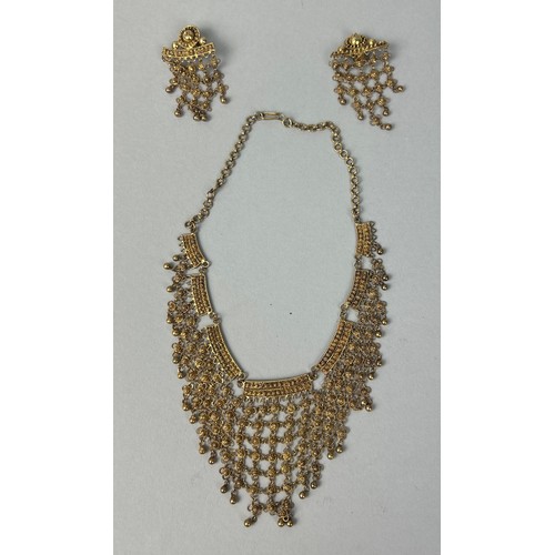 34 - A HIGH CARAT GOLD INDIAN NECKLACE AND EARRINGS SET (3) Weight: 47gms