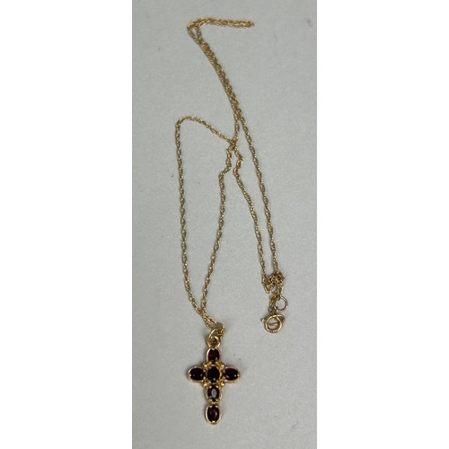 135 - A 9CT GOLD GARNET CROSS PENDENT NECKLACE 
 
Weight: 2.7 gms