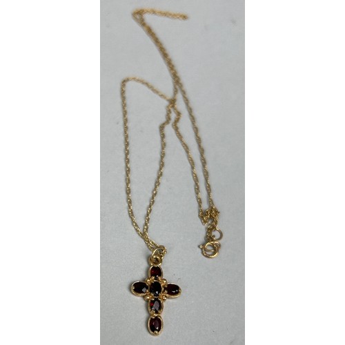 135 - A 9CT GOLD GARNET CROSS PENDENT NECKLACE 
 
Weight: 2.7 gms