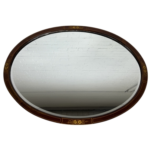 1005 - AN EDWARDIAN WALL MIRROR WITH MARQUETRY FLORAL INLAY
 
85 x 61 cm