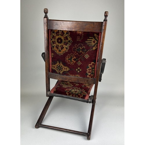 1007 - AN ANTIQUE FOLDING CHILD'S CHAIR
 
63 x 47 x 31 cm