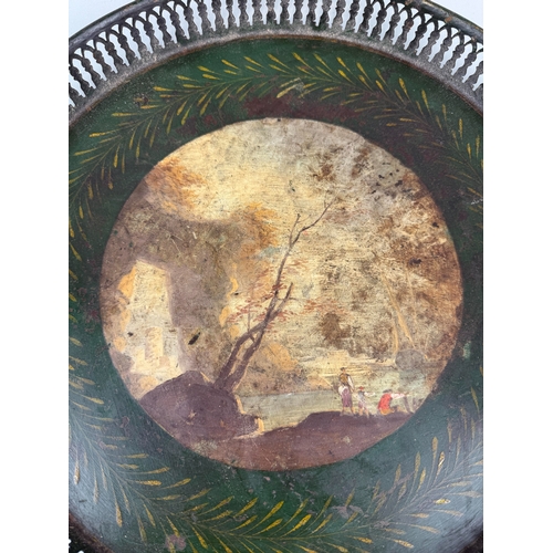 1027 - AN ANTIQUE TOLEWARE SERVING TRAY WITH PAINTED PANEL
39cm W