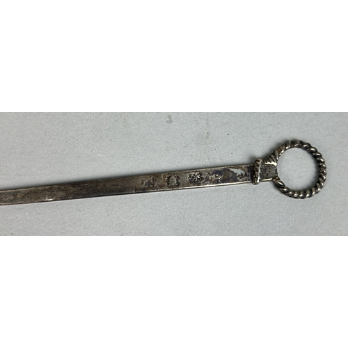 110 - AN ANTIQUE SILVER LETTER OPENER WITH A SILVER-PLATED LETTER OPENER
Silver weight: 32 gms... 