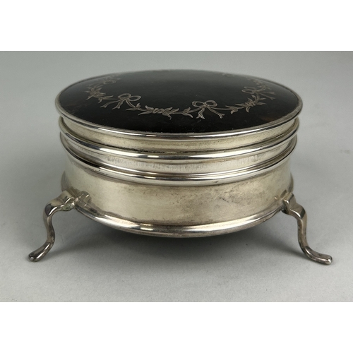 121 - AN ANTIQUE SILVER TORTOISESHELL BOX
The larger box on three legs, 9cm x 5cm