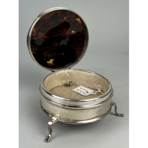 121 - AN ANTIQUE SILVER TORTOISESHELL BOX
The larger box on three legs, 9cm x 5cm