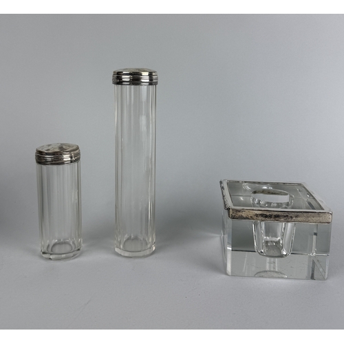 133 - A SILVER MOUNTED CANDLEHOLDER ALONG WITH TWO VANITY JARS