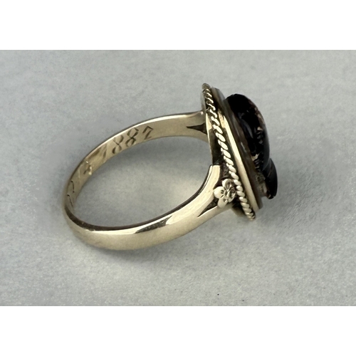 149 - A RARE 'BLACKAMOOR' CAMEO GOLD RING, THE SHANK DATED 1887
Weight: 4.4gms
 