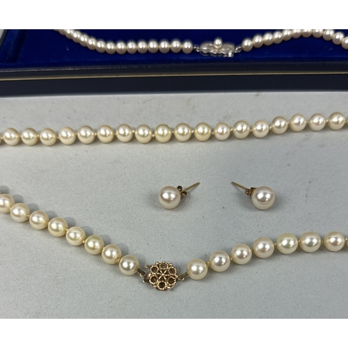 151 - A STRING OF MIKIMOTO PEARLS ALONG WITH A PEARL NECKLACE AND EARRINGS SET WITH 9CT GOLD CLASP
The Mik... 