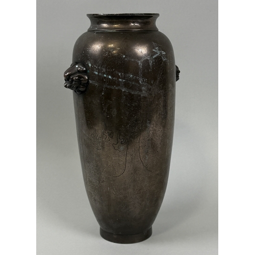 201 - A CHINESE 19TH CENTURY BRONZE VASE WITH LION HEAD HANDLES
30cm x 16cm