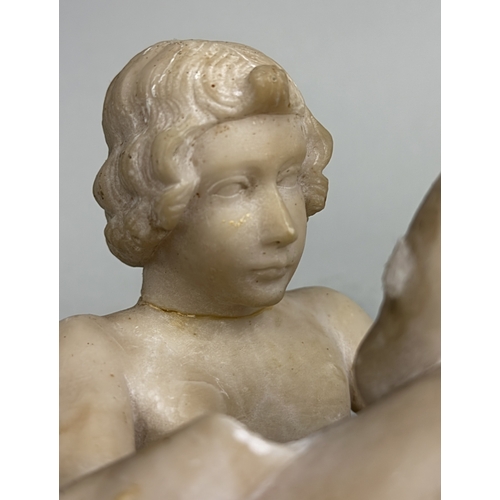 21 - A MARBLE SCULPTURE OF A BOY REMOVING A THORN FROM HIS FOOT
21cm H
Hand missing, various repairs.
Pro... 