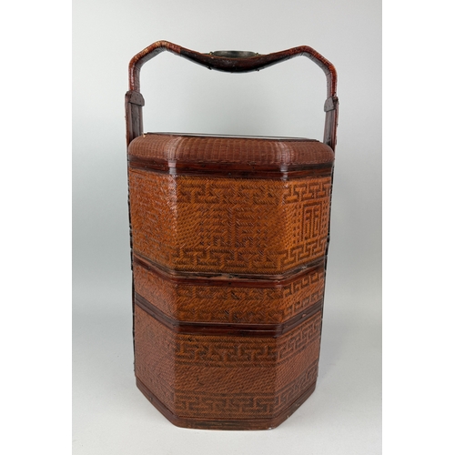 215 - A CHINESE LACQUERED PICNIC BASKET
61cm x 36cm