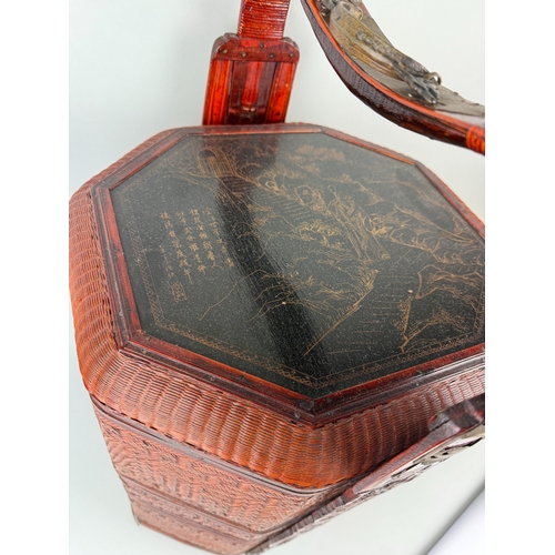 215 - A CHINESE LACQUERED PICNIC BASKET
61cm x 36cm