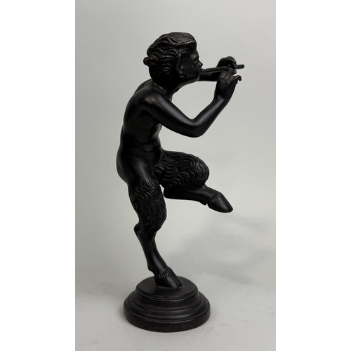 22 - A BRONZE SCULPTURE OF PAN PLAYING THE PIPES
24cm H including base.
Provenance: Private collection, S... 