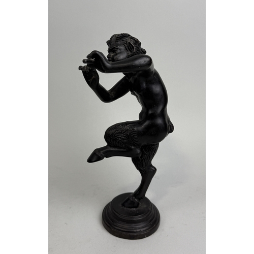 22 - A BRONZE SCULPTURE OF PAN PLAYING THE PIPES
24cm H including base.
Provenance: Private collection, S... 