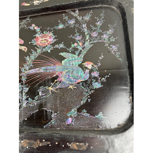 226 - AN ANTIQUE CHINESE BLACK LACQUERED TRAY WITH MOTHER OF PEARL INLAY
68cm x 49cm