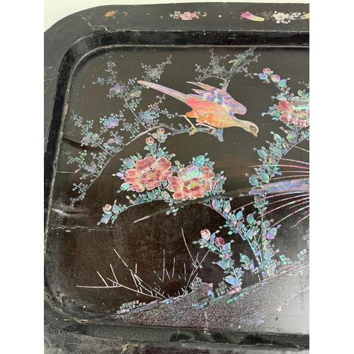 226 - AN ANTIQUE CHINESE BLACK LACQUERED TRAY WITH MOTHER OF PEARL INLAY
68cm x 49cm