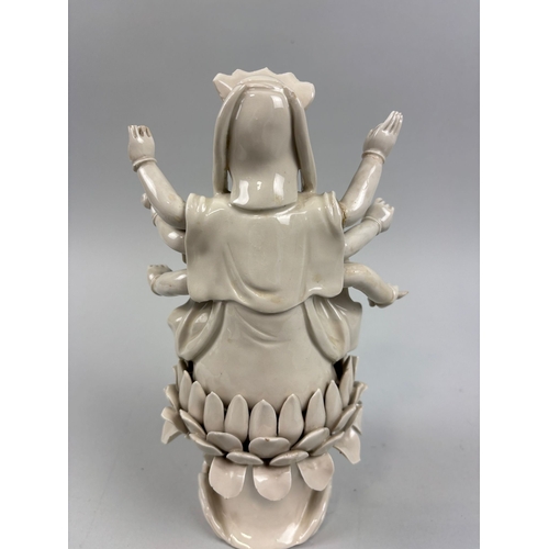 250 - A CHINESE BLANC-DE-CHINE GUANYIN FIGURE, QING DYNASTY
Height: 24cms