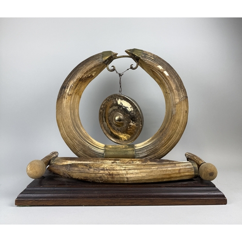 263 - A LARGE VICTORIAN HIPPO TUSK GONG WITH ENGRAVED PLAQUE 'SHOT IN THE SOBAT RIVER...XMAS 1889'
With st... 