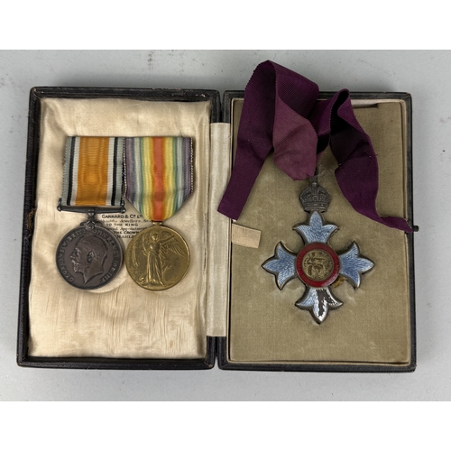 292B - A C.B.E IN GARRARD AND CO CASE, ALONG WITH TWO WAR MEDALS AWARDED TO LT COLONEL C.L. MORGAN AND FRAM... 