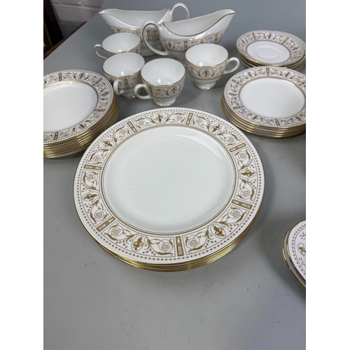 299 - A WEDGWOOD PART DINNER SERVICE, GOLD AND WHITE PATTERN APPROXIMATELY 58 PIECES