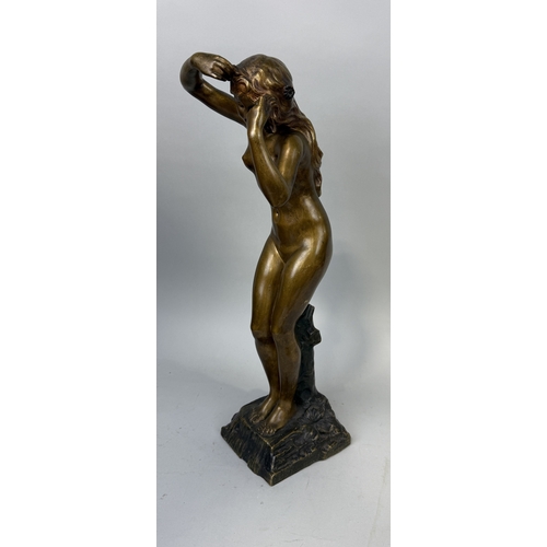 300 - AFTER AGATHON LEONARD (1841-1923): A BRONZE SCULPTURE OF A LADY
58cm H