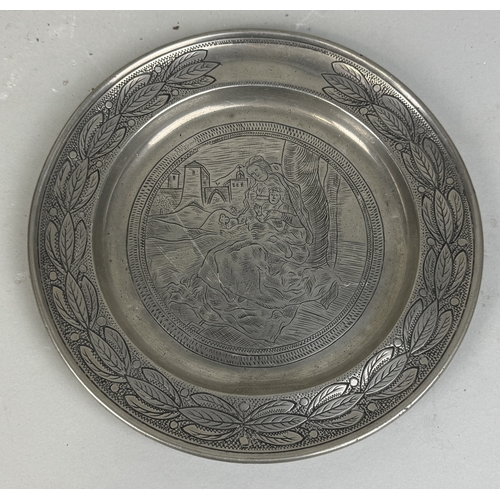 305 - AN 18TH CENTURY PEWTER ALMS DISH
20 cm D