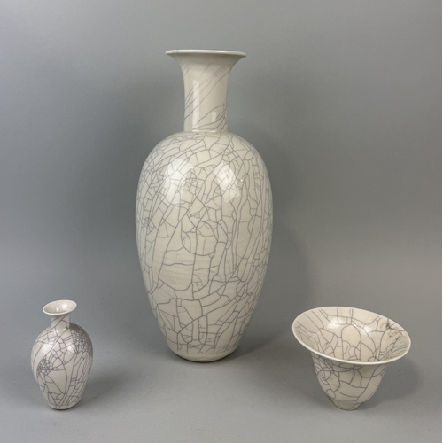 313 - CHRISTINE ANN RICHARDS (BRITISH B.1949): THREE CRACKLE GLAZED CERAMIC VASES
Tallest 44cm H... 