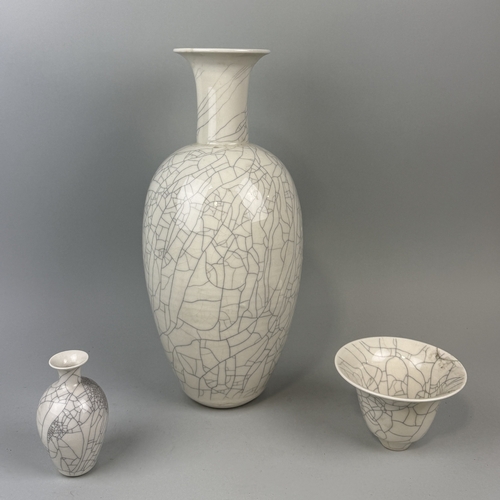 313 - CHRISTINE ANN RICHARDS (BRITISH B.1949): THREE CRACKLE GLAZED CERAMIC VASES
Tallest 44cm H... 