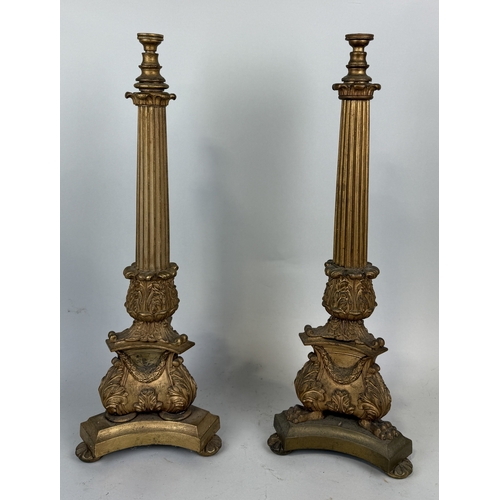 316 - A NEAR PAIR OF GILDED METAL EMPIRE STYLE TABLE LAMPS
54cm h each.