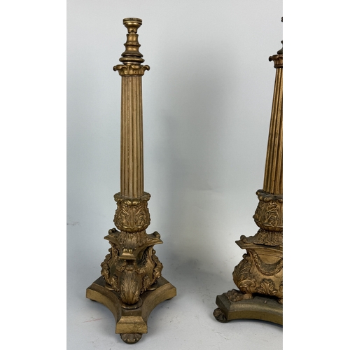 316 - A NEAR PAIR OF GILDED METAL EMPIRE STYLE TABLE LAMPS
54cm h each.