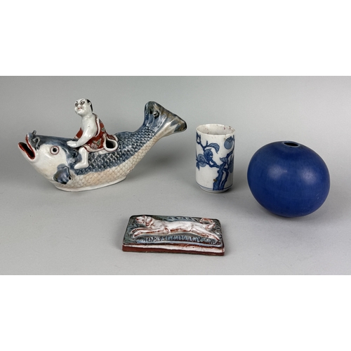 319 - A JAPANESE ARITA STYLE BOY RIDING A CARP ALONG WITH A BLUE GLAZED CERAMIC BOWL, CHINESE BRUSH POT AN... 